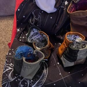 Hand made small bag out of leather scraps. Holds approximately 6-8 oz.